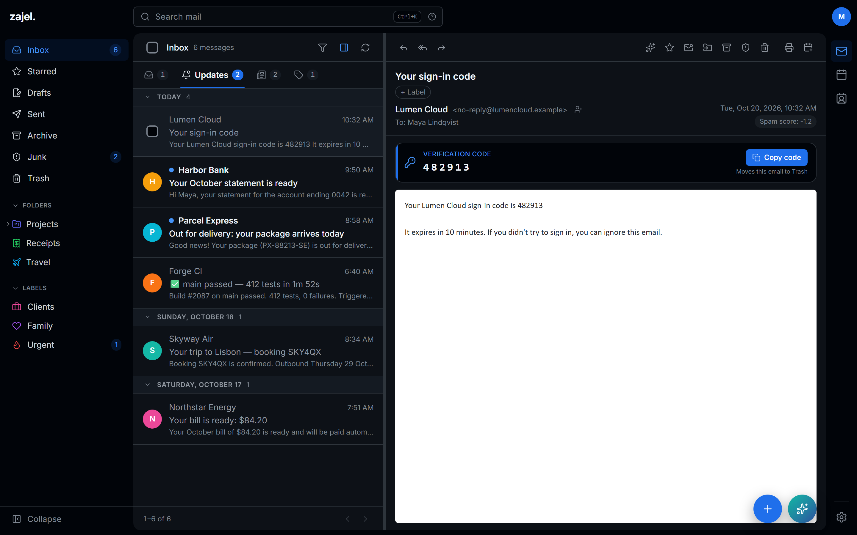 A sign-in code email in the Updates tab, with the detected code and a Copy code button